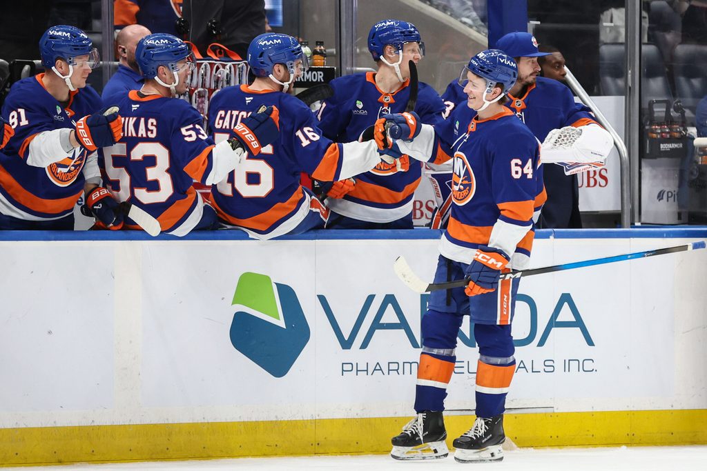 Apr 9, 2026; Elmont, New York, USA; New York Islanders center Calum Ritchie (64) celebrates with teammates after scoring a goal in the third period against the Toronto Maple Leafs at UBS Arena. Mandatory Credit: Wendell Cruz-Imagn Images