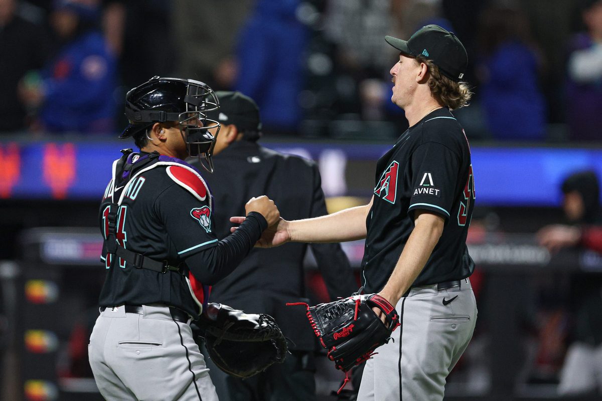 Apr 9, 2026; New York City, New York, USA;  Arizona Diamondbacks pitcher Taylor Rashi (54) and Gabriel Moreno celebrate after defeating the New York Mets at Citi Field. Mandatory Credit: Vincent Carchietta-Imagn Images
