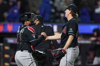 Apr 9, 2026; New York City, New York, USA;  Arizona Diamondbacks pitcher Taylor Rashi (54) and Gabriel Moreno celebrate after defeating the New York Mets at Citi Field. Mandatory Credit: Vincent Carchietta-Imagn Images