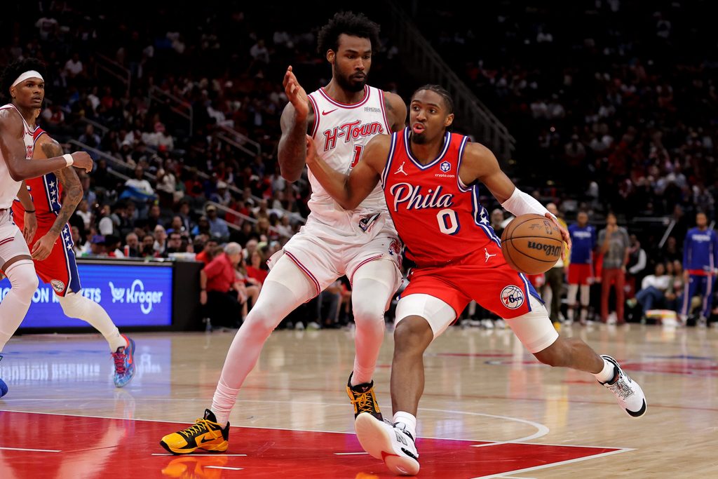 Apr 9, 2026; Houston, Texas, USA; Philadelphia 76ers guard Tyrese Maxey (0) handles the ball against Houston Rockets forward Tari Eason (17) during the fourth quarter at Toyota Center. Mandatory Credit: Erik Williams-Imagn Images
