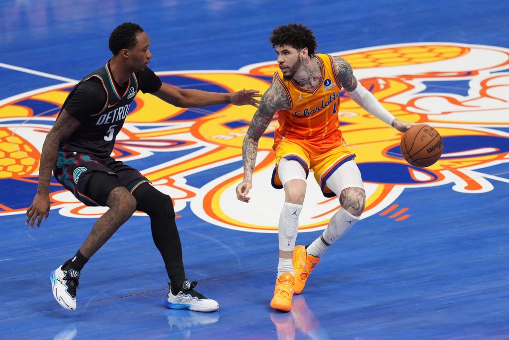 Apr 10, 2026; Charlotte, North Carolina, USA; Charlotte Hornets guard LaMelo Ball (1) brings the ball up court against Detroit Pistons forward Ronald Holland II (5) during the second half at Spectrum Center. Mandatory Credit: Jim Dedmon-Imagn Images