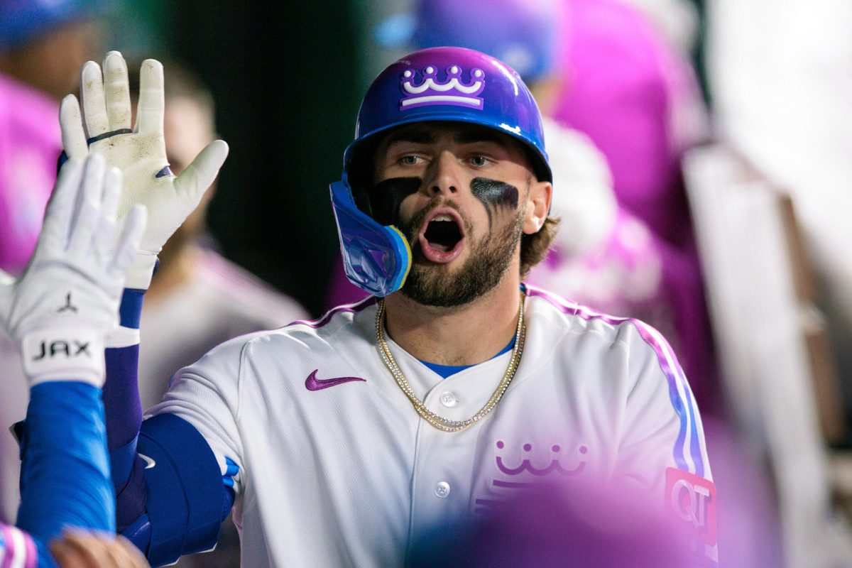 Apr 10, 2026; Kansas City, Missouri, USA; Kansas City Royals catcher Carter Jensen (22) celebrates in the dugout after a home run during the seventh inning against the Chicago White Sox at Kauffman Stadium. Mandatory Credit: William Purnell-Imagn Images