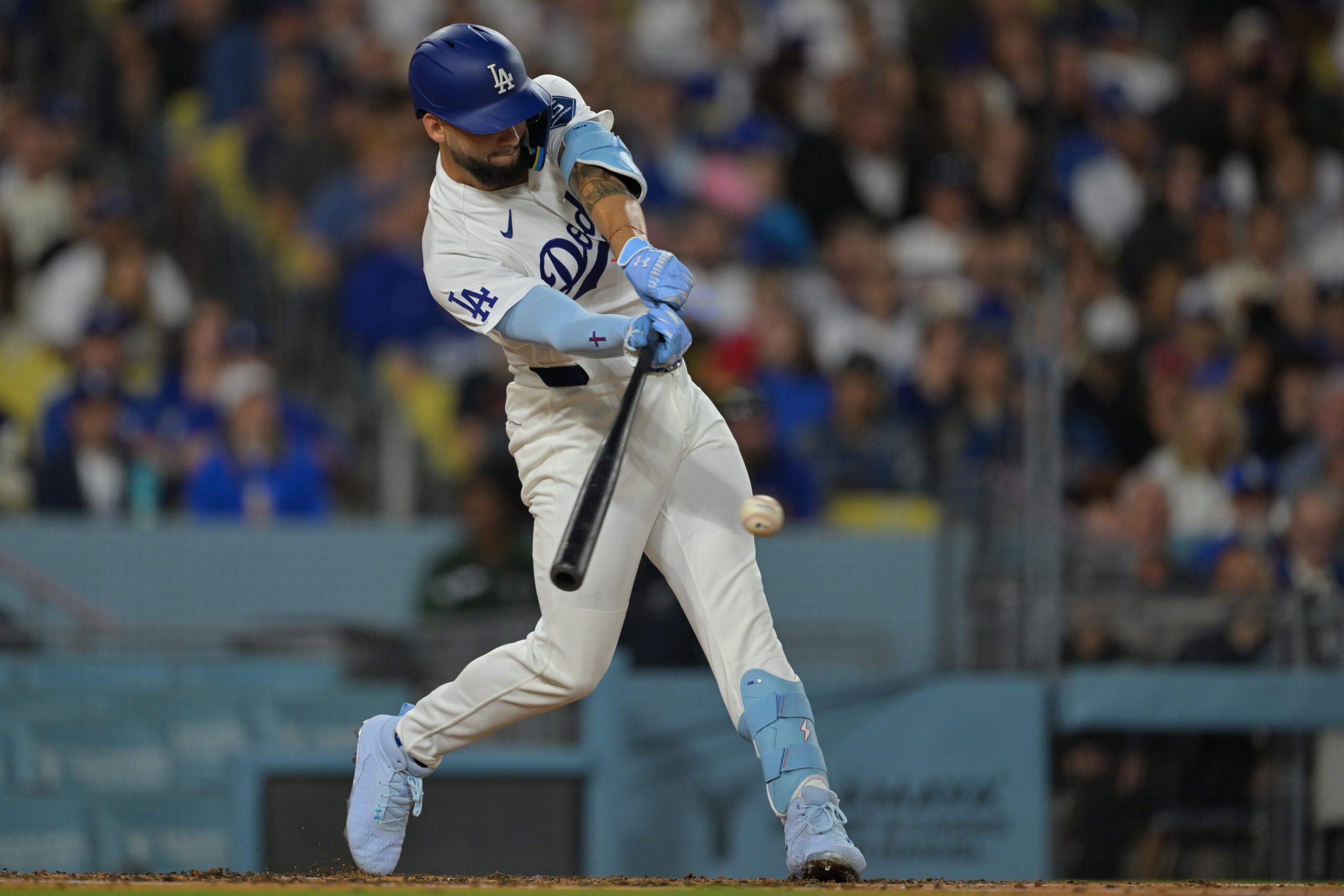 Apr 10, 2026; Los Angeles, California, USA; Los Angeles Dodgers center fielder Andy Pages (44) hits a single during the second inning against the Texas Rangers at Dodger Stadium. Mandatory Credit: Jayne Kamin-Oncea-Imagn Images
