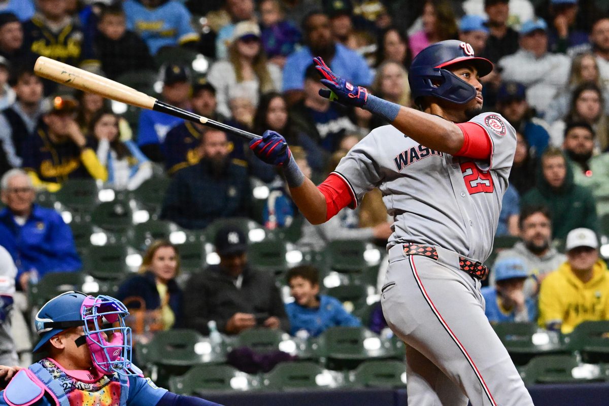 Apr 10, 2026; Milwaukee, Wisconsin, USA; Washington Nationals right fielder James Wood (29) hits a double to drive in a run in the ninth inning against the Milwaukee Brewers  at American Family Field. Mandatory Credit: Benny Sieu-Imagn Images
