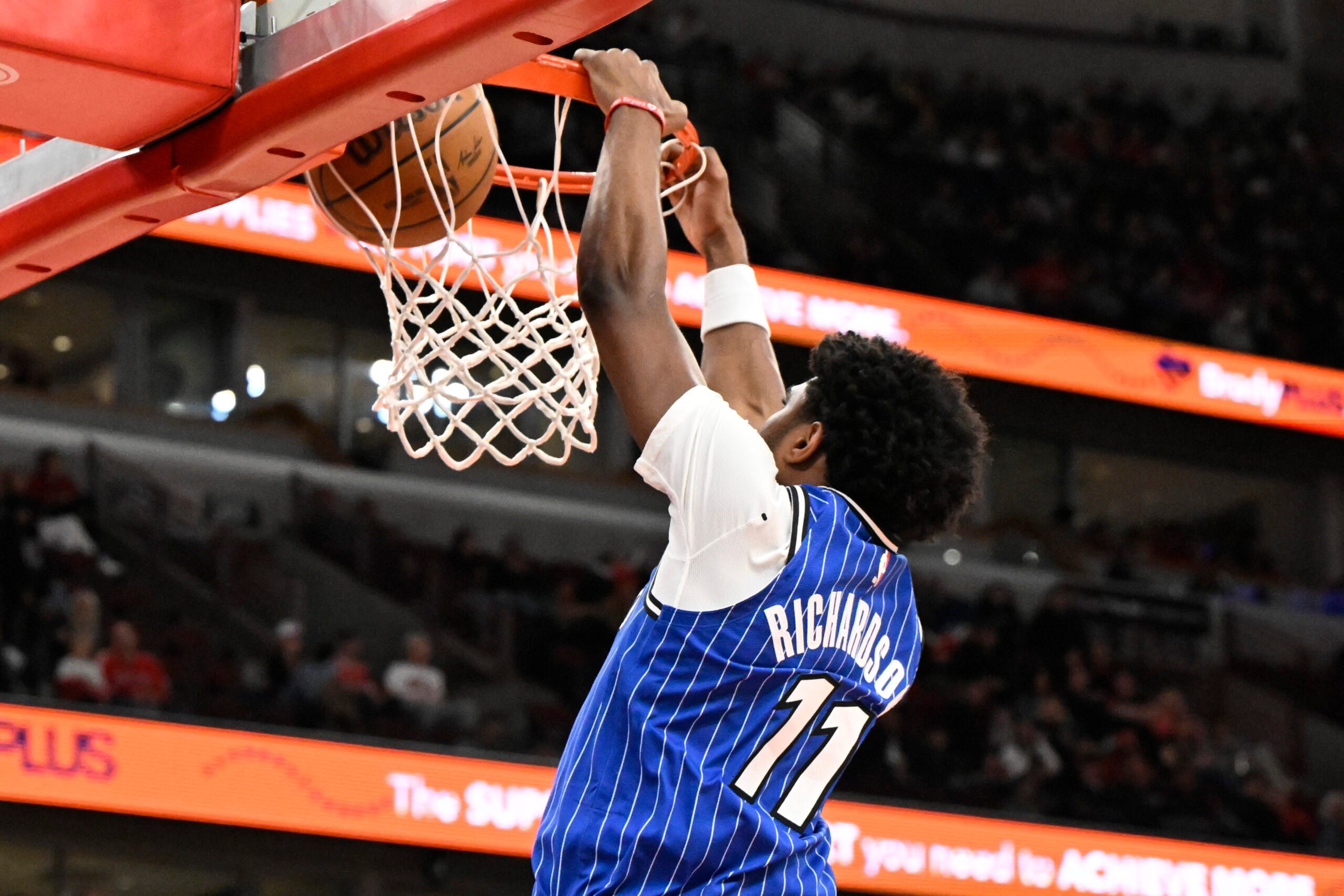 Apr 10, 2026; Chicago, Illinois, USA;  Orlando Magic guard Jase Richardson (11) dunks the ball against the Chicago Bulls during the second half at the United Center. Mandatory Credit: Matt Marton-Imagn Images
