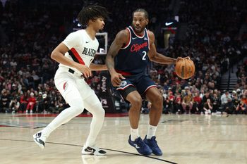 Apr 10, 2026; Portland, Oregon, USA;  Portland Trail Blazers guard Shaedon Sharpe (17) defends LA Clippers forward Kawhi Leonard (2) during the first half at Moda Center. Mandatory Credit: Jaime Valdez-Imagn Images