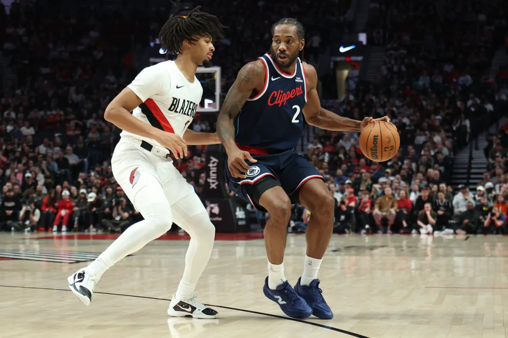Apr 10, 2026; Portland, Oregon, USA; Portland Trail Blazers guard Shaedon Sharpe (17) defends LA Clippers forward Kawhi Leonard (2) during the first half at Moda Center. Mandatory Credit: Jaime Valdez-Imagn Images