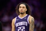 Apr 10, 2026; Sacramento, California, USA; Sacramento Kings guard Devin Carter (22) looks on after making a three point basket against the Golden State Warriors during the fourth quarter at Golden 1 Center. Mandatory Credit: Robert Edwards-Imagn Images