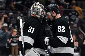 Apr 11, 2026; Los Angeles, California, USA; Los Angeles Kings goaltender Anton Forsberg (31) and Los Angeles Kings right wing Taylor Ward (52) celebrate after the win against the Edmonton Oilers at Crypto.com Arena. Mandatory Credit: Griffin Hooper-Imagn Images