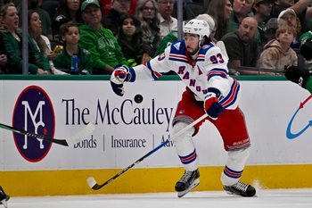 Apr 11, 2026; Dallas, Texas, USA; New York Rangers center Mika Zibanejad (93) controls the puck during the third period against the Dallas Stars at the American Airlines Center. Mandatory Credit: Jerome Miron-Imagn Images