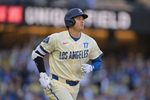 Apr 11, 2026; Los Angeles, California, USA; Los Angeles Dodgers two-way player Shohei Ohtani (17) runs after hitting a solo home run against the Texas Rangers during the first inning at Dodger Stadium. Mandatory Credit: Jayne Kamin-Oncea-Imagn Images