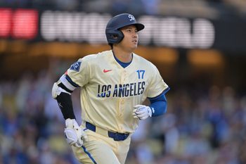 Apr 11, 2026; Los Angeles, California, USA; Los Angeles Dodgers two-way player Shohei Ohtani (17) runs after hitting a solo home run against the Texas Rangers during the first inning at Dodger Stadium. Mandatory Credit: Jayne Kamin-Oncea-Imagn Images