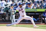 Apr 12, 2026; New York City, New York, USA;  New York Mets starting pitcher Freddy Peralta (51) pitches in the first inning against the Athletics at Citi Field. Mandatory Credit: Wendell Cruz-Imagn Images