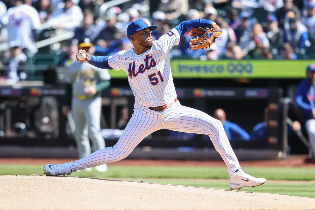 Apr 12, 2026; New York City, New York, USA; New York Mets starting pitcher Freddy Peralta (51) pitches in the first inning against the Athletics at Citi Field. Mandatory Credit: Wendell Cruz-Imagn Images