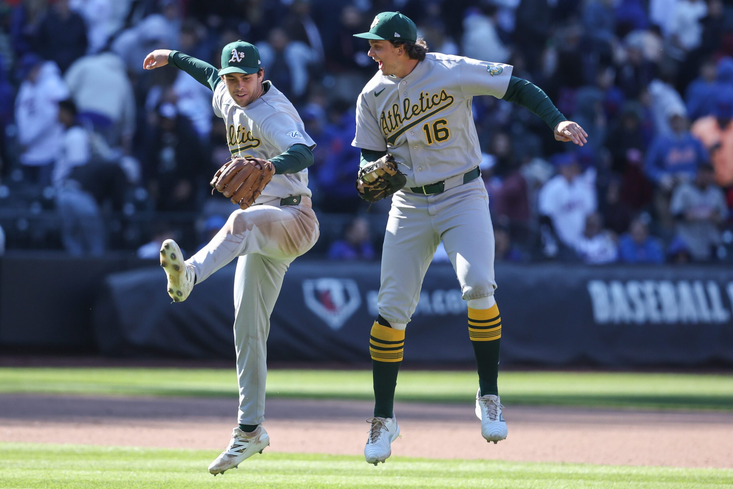 Apr 12, 2026; New York City, New York, USA;  Athletics third baseman Max Muncy (3) and first baseman Nick Kurtz (16) celebrate after defeating the New York Mets 1-0 at Citi Field. Mandatory Credit: Wendell Cruz-Imagn Images