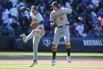Apr 12, 2026; New York City, New York, USA;  Athletics third baseman Max Muncy (3) and first baseman Nick Kurtz (16) celebrate after defeating the New York Mets 1-0 at Citi Field. Mandatory Credit: Wendell Cruz-Imagn Images