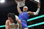 Apr 12, 2026; Boston, Massachusetts, USA; Orlando Magic forward Paolo Banchero (5) dunks the ball during the first half against the Boston Celtics at TD Garden. Mandatory Credit: Paul Rutherford-Imagn Images