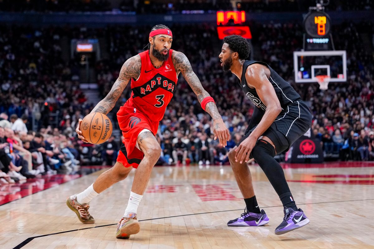 Apr 12, 2026; Toronto, Ontario, CAN;  Toronto Raptors Brandon Ingram (3) dribbles against Brooklyn Nets Chaney Johnson (31) during the second half at Scotiabank Arena. Mandatory Credit: Kevin Sousa-Imagn Images