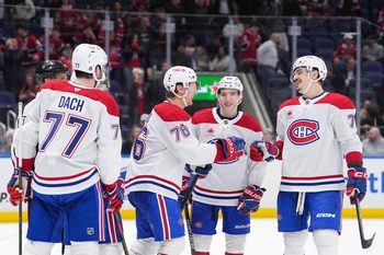 Apr 12, 2026; Elmont, New York, USA; Montreal Canadiens right wing Zachary Bolduc (76) celebrates a third period goal with center Kirby Dach (77), defenseman Lane Hutson (48) and defenseman Arber Xhekaj (72) at UBS Arena. Mandatory Credit: Alexander Wohl-Imagn Images