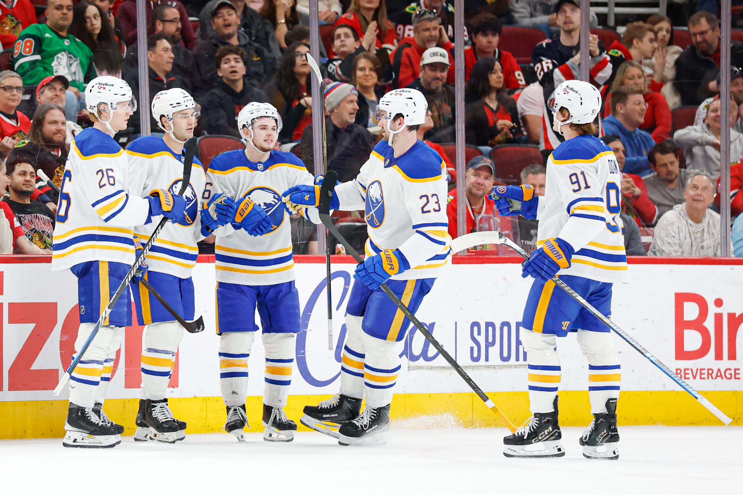 Apr 13, 2026; Chicago, Illinois, USA; Buffalo Sabres center Josh Norris (9) celebrates with teammates after scoring against the Chicago Blackhawks during the first period at United Center. Mandatory Credit: Kamil Krzaczynski-Imagn Images