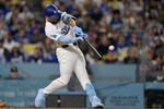 Apr 13, 2026; Los Angeles, California, USA; Los Angeles Dodgers center fielder Andy Pages (44) hits a three run home run against the New York Mets during the third inning at Dodger Stadium. Mandatory Credit: Jayne Kamin-Oncea-Imagn Images