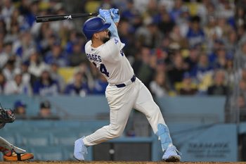 Apr 13, 2026; Los Angeles, California, USA; Los Angeles Dodgers center fielder Andy Pages (44) hits a three run home run against the New York Mets during the third inning at Dodger Stadium. Mandatory Credit: Jayne Kamin-Oncea-Imagn Images