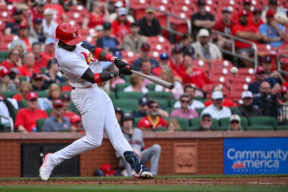 Apr 15, 2026; St. Louis, Missouri, USA; St. Louis Cardinals right fielder Jordan Walker (18) hits a double against the Cleveland Guardians during the eighth inning at Busch Stadium. Players and coaches are wearing number 42 in recognition of Jackie Robinson Day. Mandatory Credit: Jeff Curry-Imagn Images
