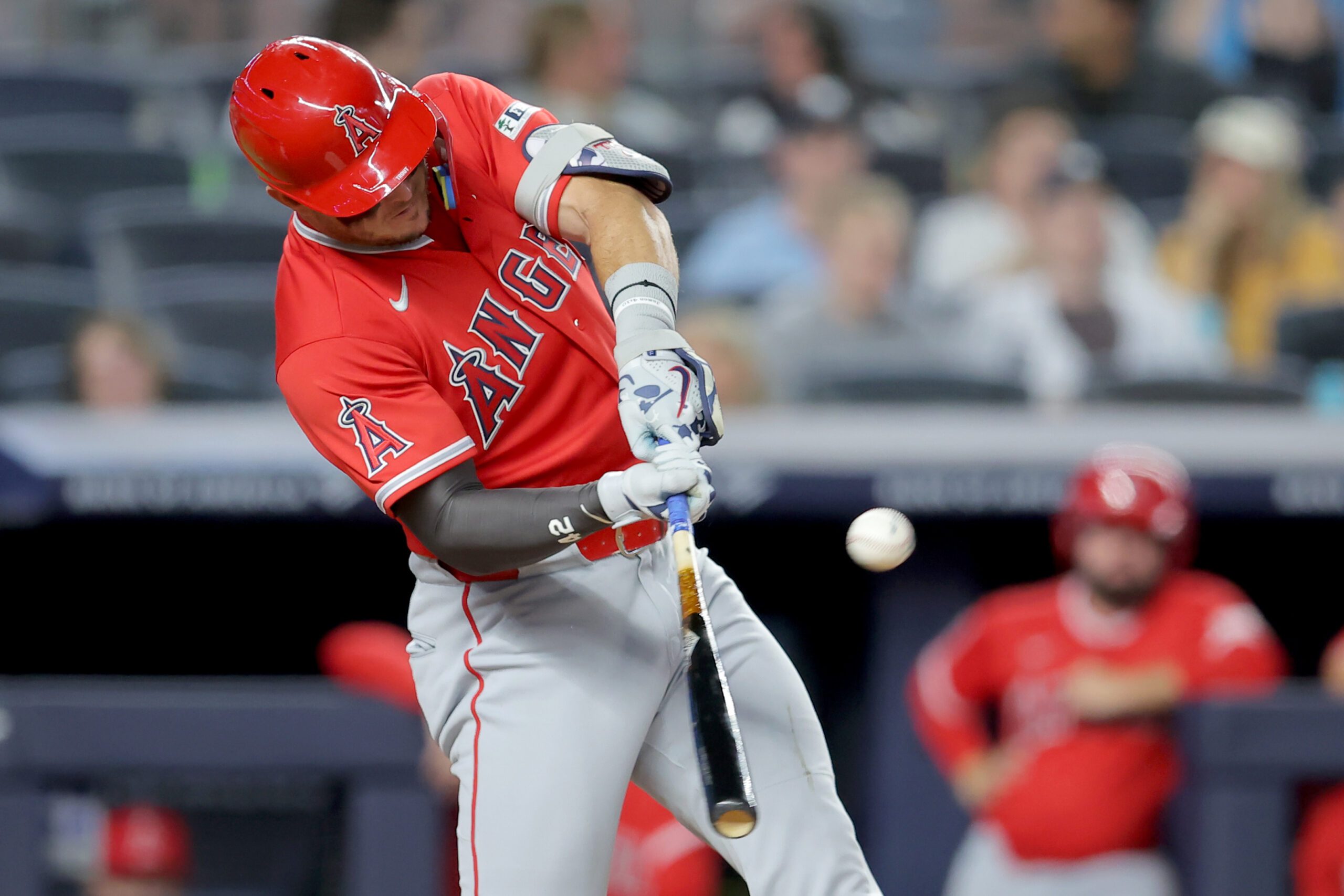 Apr 15, 2026; Bronx, New York, USA; Los Angeles Angels center fielder Mike Trout hits a two run home run against the New York Yankees during the fifth inning at Yankee Stadium. All MLB players are wearing number 42 today to honor Jackie Robinson. Mandatory Credit: Brad Penner-Imagn Images