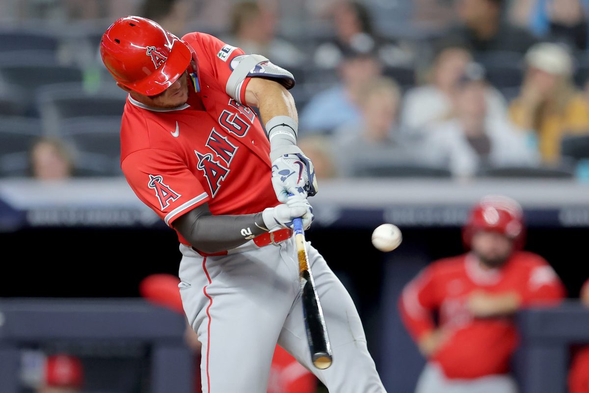 Apr 15, 2026; Bronx, New York, USA; Los Angeles Angels center fielder Mike Trout hits a two run home run against the New York Yankees during the fifth inning at Yankee Stadium. All MLB players are wearing number 42 today to honor Jackie Robinson. Mandatory Credit: Brad Penner-Imagn Images