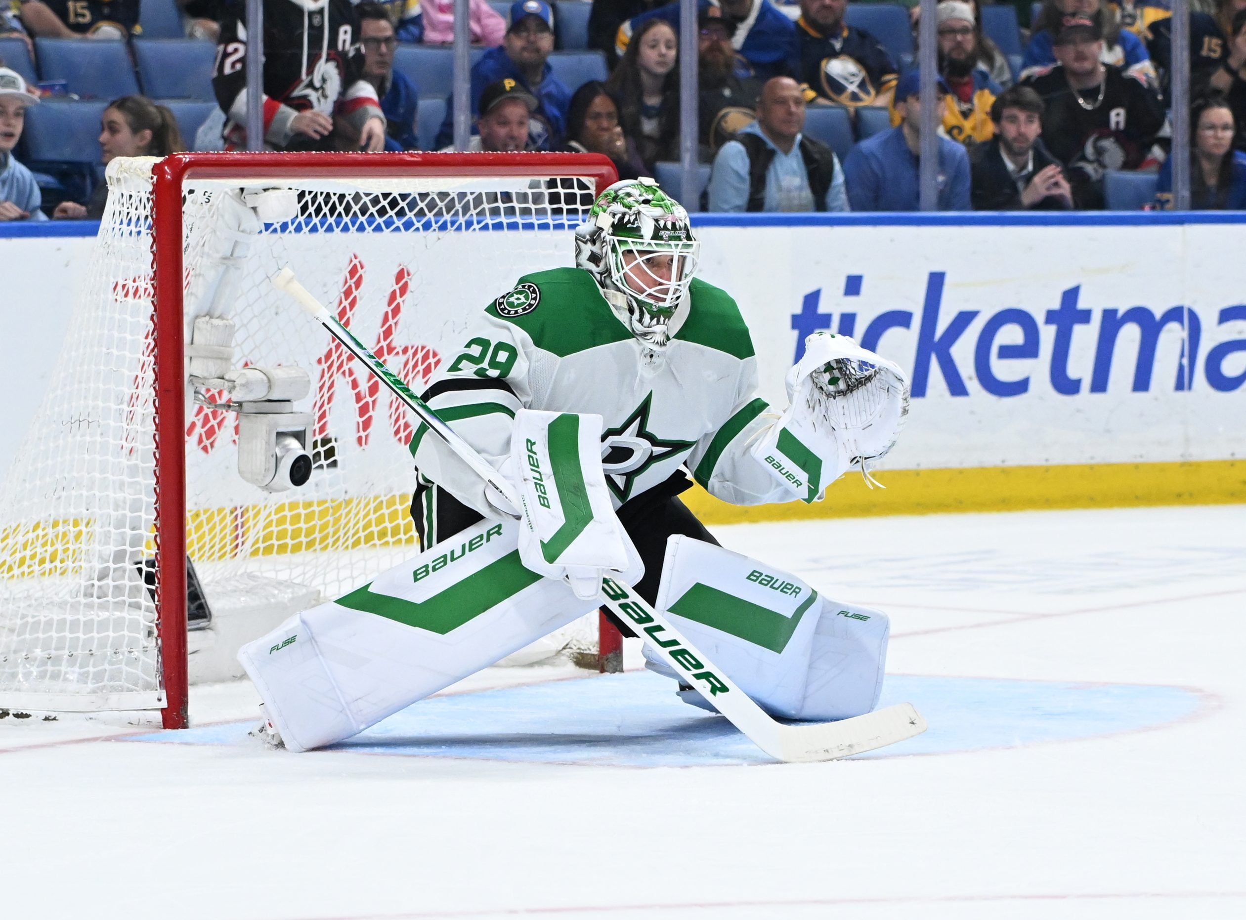 Apr 15, 2026; Buffalo, New York, USA; Dallas Stars goaltender Jake Oettinger (29) prepares to defend a shot in an overtime period against the Buffalo Sabres at KeyBank Center. Mandatory Credit: Mark Konezny-Imagn Images