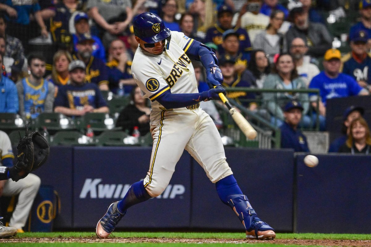 Apr 15, 2026; Milwaukee, Wisconsin, USA; Milwaukee Brewers designated hitter William Contreras (24) hits a single to drive in a run in the eighth inning against the Toronto Blue Jays at American Family Field. Mandatory Credit: Benny Sieu-Imagn Images