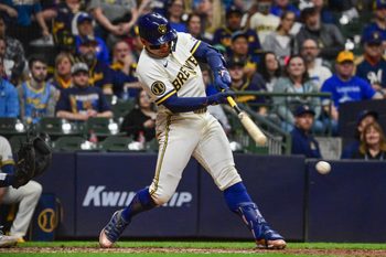 Apr 15, 2026; Milwaukee, Wisconsin, USA; Milwaukee Brewers designated hitter William Contreras (24) hits a single to drive in a run in the eighth inning against the Toronto Blue Jays at American Family Field. Mandatory Credit: Benny Sieu-Imagn Images