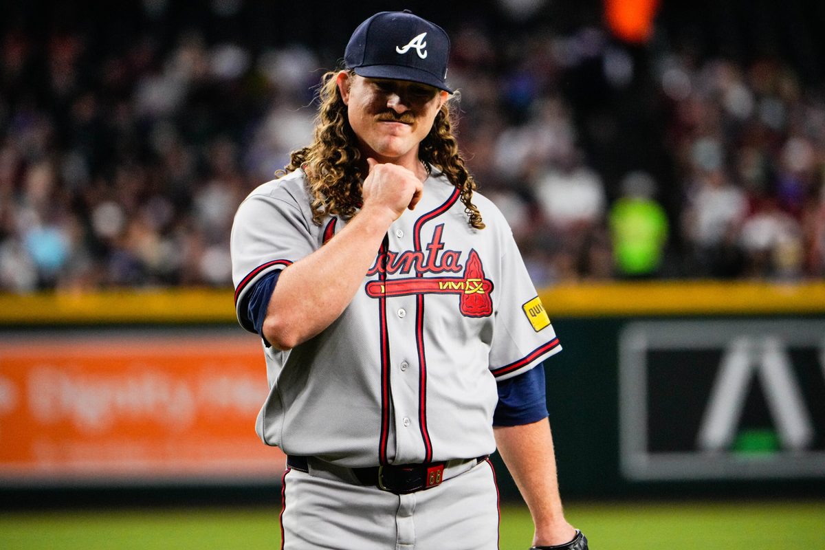 Apr 3, 2026; Phoenix, Arizona, USA; Atlanta Braves pitcher Grant Holmes (66) walks off the mound at the end first inning at Chase Field. Mandatory Credit: Arianna Grainey-Imagn Images