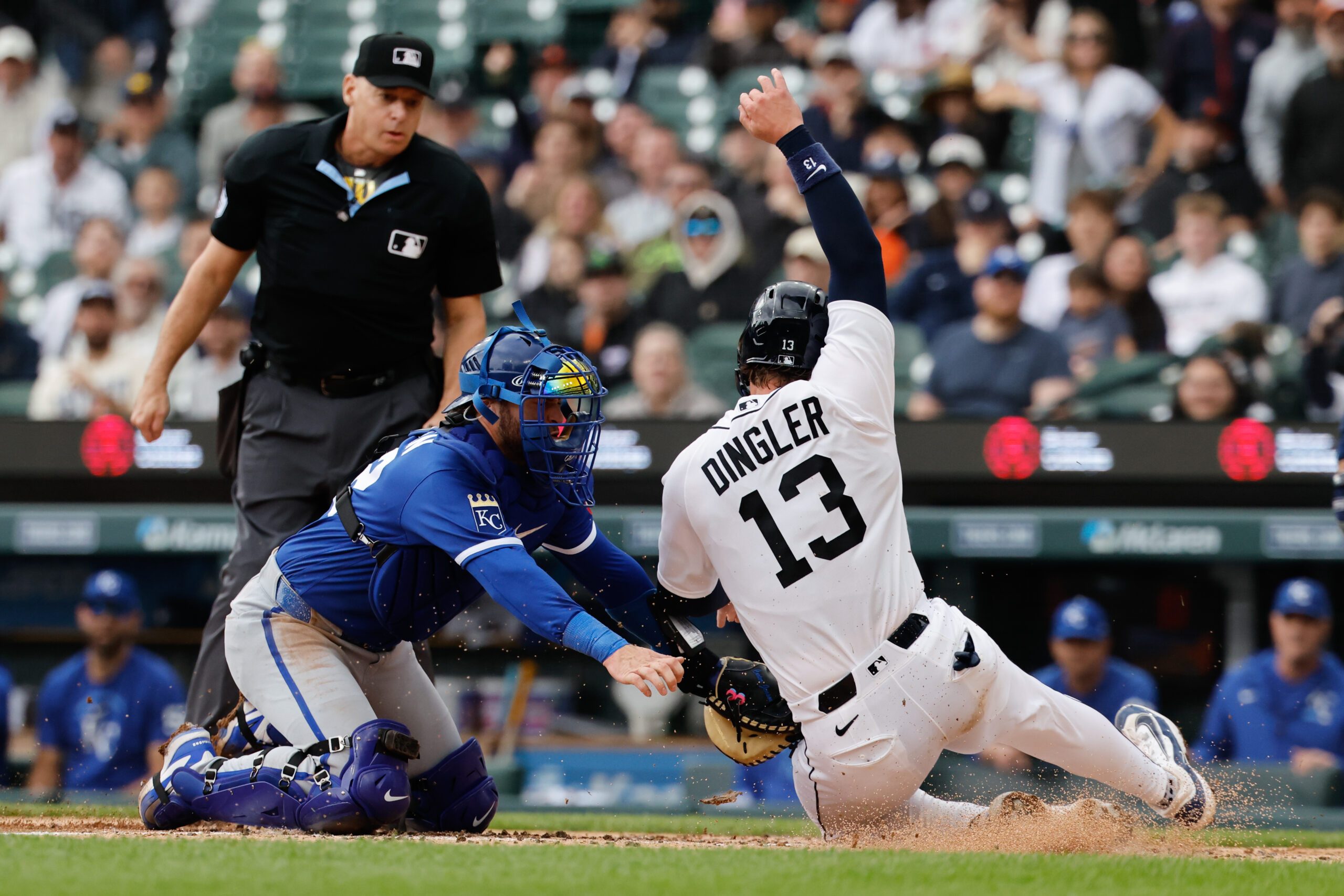 Apr 16, 2026; Detroit, Michigan, USA;  Kansas City Royals catcher Carter Jensen (22) tags Detroit Tigers catcher Dillon Dingler (13) out at home in the fourth inning at Comerica Park. Mandatory Credit: Rick Osentoski-Imagn Images