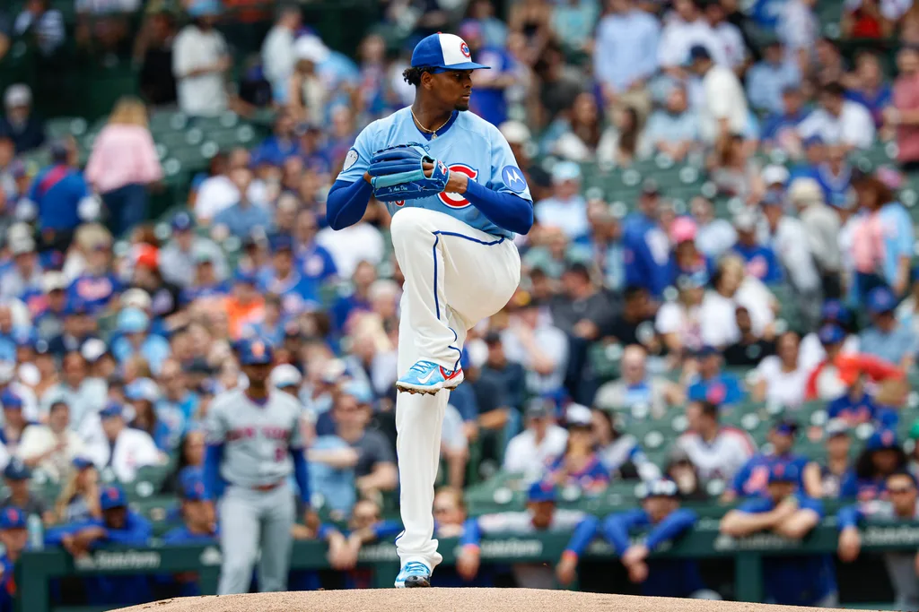 Apr 17, 2026; Chicago, Illinois, USA; Chicago Cubs starting pitcher Edward Cabrera (30) delivers a pitch against the New York Mets during the first inning at Wrigley Field. Mandatory Credit: Kamil Krzaczynski-Imagn Images