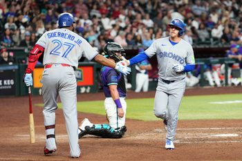 Apr 17, 2026; Phoenix, Arizona, USA; Toronto Blue Jays center fielder Myles Straw (3) slaps hands with Toronto Blue Jays first baseman Vladimir Guerrero Jr. (27) after hitting a solo home run against the Arizona Diamondbacks during the sixth inning at Chase Field. Mandatory Credit: Joe Camporeale-Imagn Images