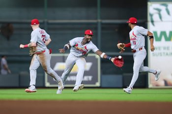 Apr 17, 2026; Houston, Texas, USA; St. Louis Cardinals right fielder Jordan Walker (18) celebrates with left fielder Nathan Church (27) and center fielder Victor Scott II (11) after the game against the Houston Astros at Daikin Park. Mandatory Credit: Troy Taormina-Imagn Images