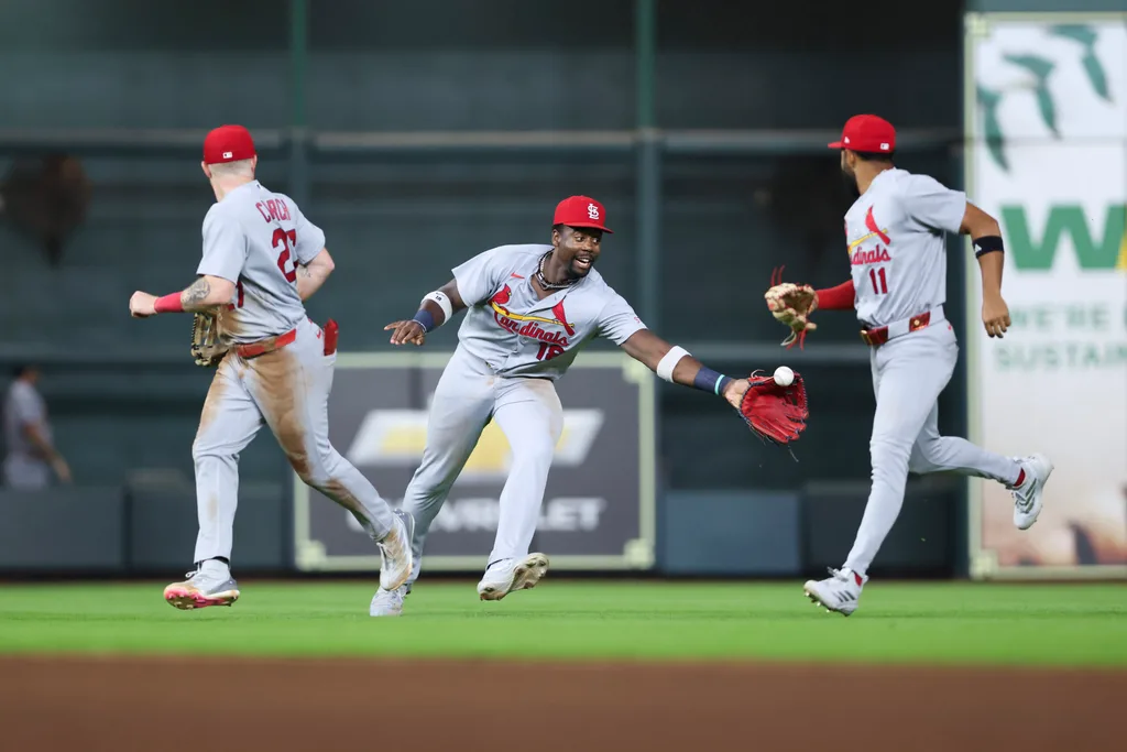 Apr 17, 2026; Houston, Texas, USA; St. Louis Cardinals right fielder Jordan Walker (18) celebrates with left fielder Nathan Church (27) and center fielder Victor Scott II (11) after the game against the Houston Astros at Daikin Park. Mandatory Credit: Troy Taormina-Imagn Images