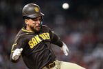 Apr 17, 2026; Anaheim, California, USA; San Diego Padres catcher Luis Campusano (12) runs during the seventh inning against the Los Angeles Angels at Angel Stadium. Mandatory Credit: William Liang-Imagn Images