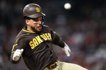 Apr 17, 2026; Anaheim, California, USA; San Diego Padres catcher Luis Campusano (12) runs during the seventh inning against the Los Angeles Angels at Angel Stadium. Mandatory Credit: William Liang-Imagn Images