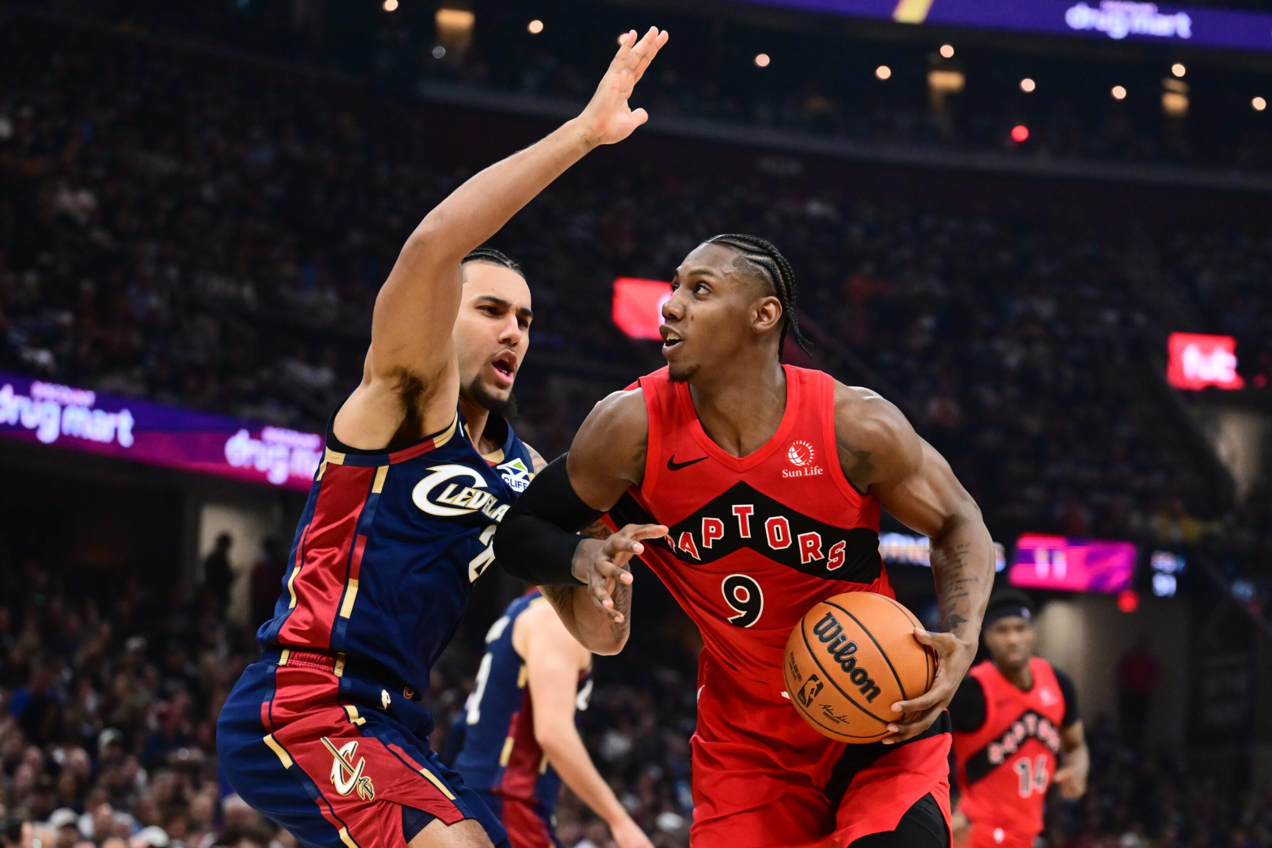 Apr 18, 2026; Cleveland, Ohio, USA; Toronto Raptors forward RJ Barrett (9) drives to the basket against Cleveland Cavaliers guard Jaylon Tyson (20) during the second half of game one in the first round of the 2026 NBA Playoffs at Rocket Arena. Mandatory Credit: Ken Blaze-Imagn Images