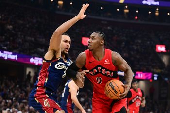 Apr 18, 2026; Cleveland, Ohio, USA; Toronto Raptors forward RJ Barrett (9) drives to the basket against Cleveland Cavaliers guard Jaylon Tyson (20) during the second half of game one in the first round of the 2026 NBA Playoffs at Rocket Arena. Mandatory Credit: Ken Blaze-Imagn Images