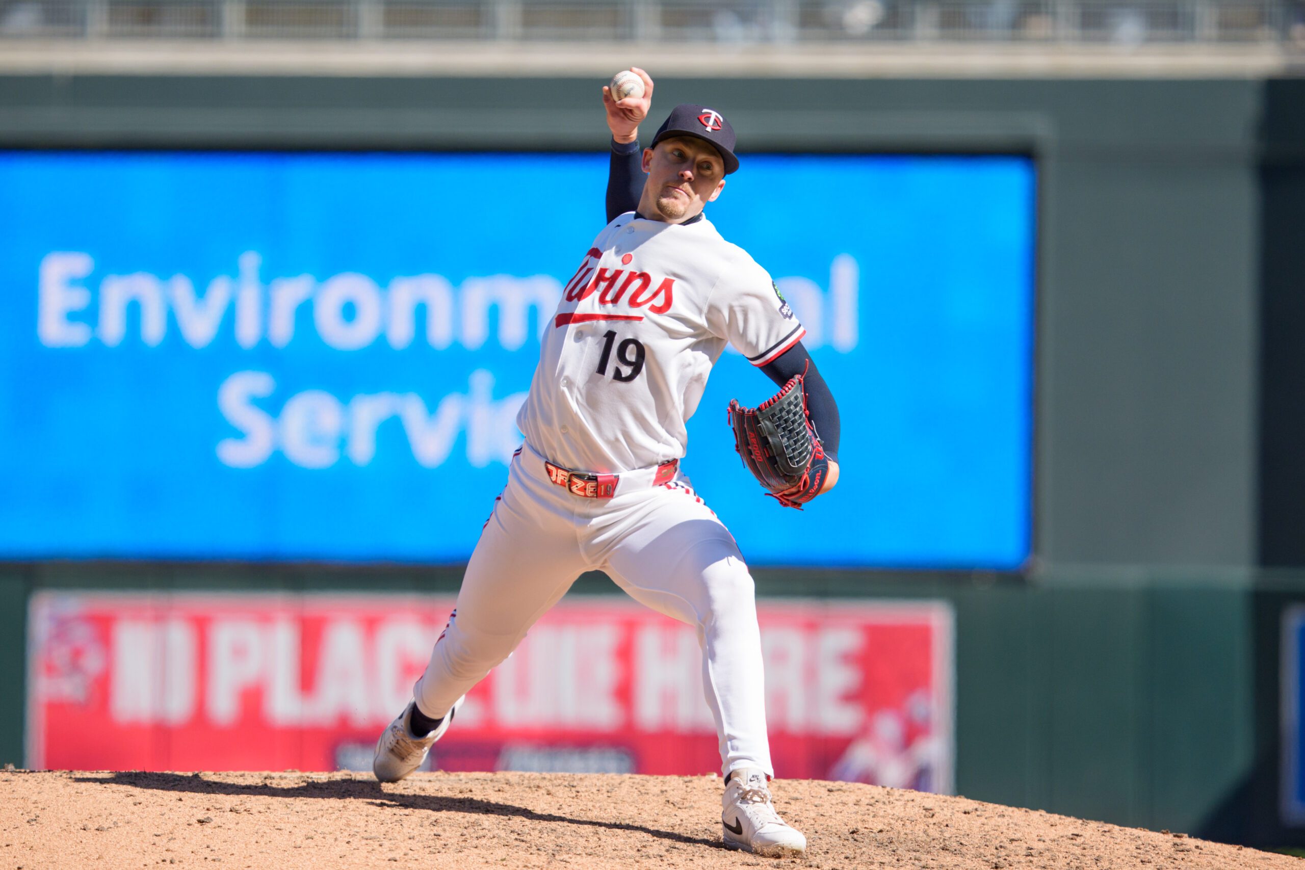 Apr 18, 2026; Minneapolis, Minnesota, USA; Minnesota Twins pitcher Eric Orze (19) pitches to Cincinnati Reds first baseman Nathaniel Lowe (31) in the eighth inning at Target Field. Mandatory Credit: Matt Blewett-Imagn Images