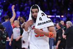 Apr 18, 2026; New York, New York, USA; New York Knicks center Karl-Anthony Towns (32) on the court after defeating the Atlanta Hawks of the 2026 NBA Playoffs at Madison Square Garden. Mandatory Credit: Vincent Carchietta-Imagn Images