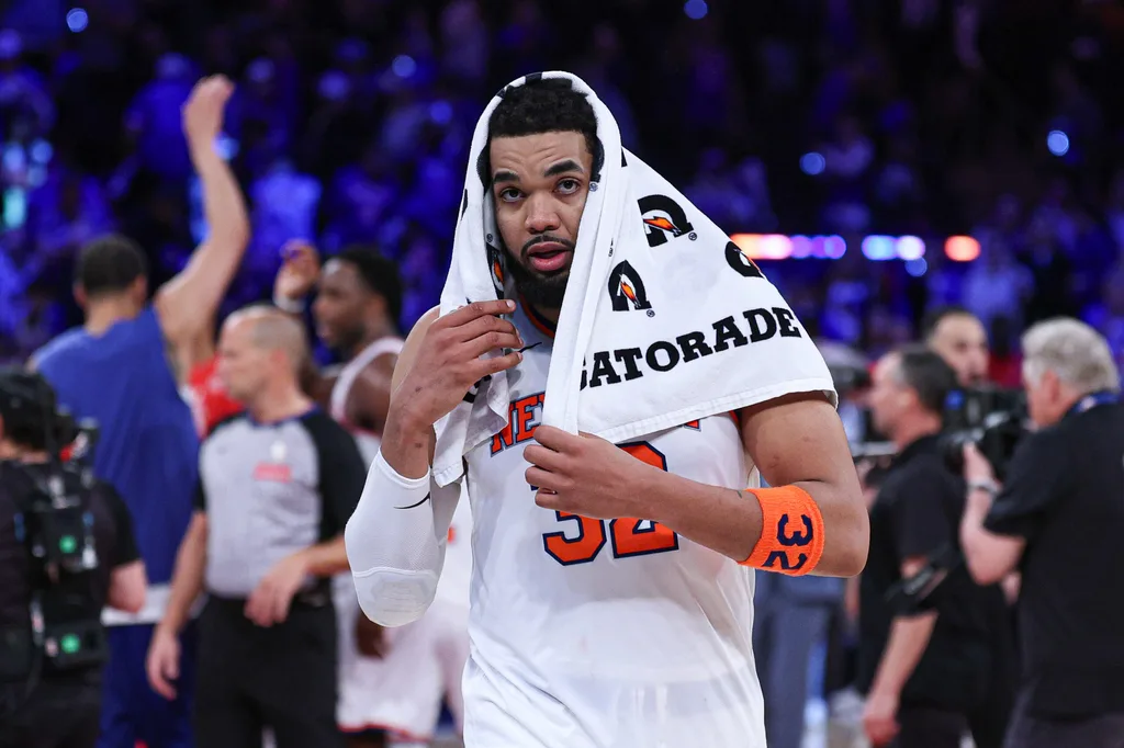 Apr 18, 2026; New York, New York, USA; New York Knicks center Karl-Anthony Towns (32) on the court after defeating the Atlanta Hawks of the 2026 NBA Playoffs at Madison Square Garden. Mandatory Credit: Vincent Carchietta-Imagn Images