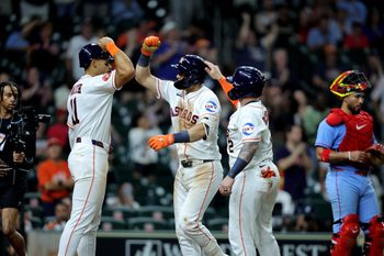 Apr 18, 2026; Houston, Texas, USA; Houston Astros third baseman Shay Whitcomb (14) is congratulated by teammates after hitting a three-run home run against the St. Louis Cardinals during the ninth inning at Daikin Park. Mandatory Credit: Erik Williams-Imagn Images
