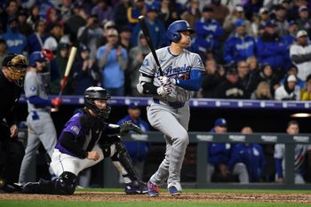 Apr 18, 2026; Denver, Colorado, USA; Los Angeles Dodgers designated hitter Shohei Ohtani (17) singles during the ninth inning against the Los Angeles Dodgers at Coors Field. Mandatory Credit: Christopher Hanewinckel-Imagn Images
