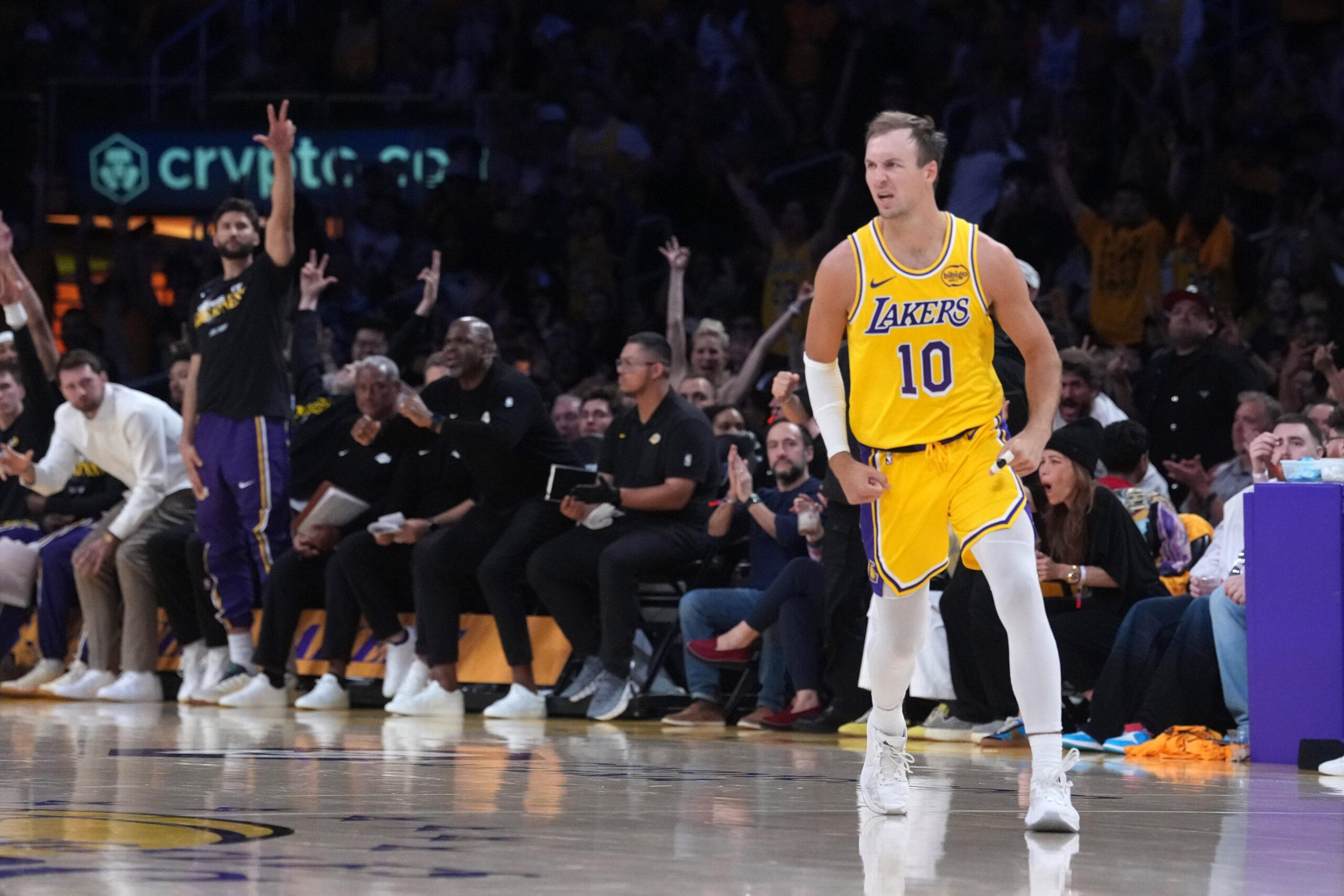 Apr 18, 2026; Los Angeles, California, USA; Los Angeles Lakers guard Luke Kennard (10) celebrates against the Houston Rockets in the second half during game one of the first round of the 2026 NBA Playoffs at Crypto.com Arena. Mandatory Credit: Kirby Lee-Imagn Images