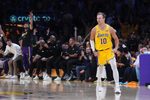 Apr 18, 2026; Los Angeles, California, USA; Los Angeles Lakers guard Luke Kennard (10) celebrates against the Houston Rockets in the second half during game one of the first round of the 2026 NBA Playoffs at Crypto.com Arena. Mandatory Credit: Kirby Lee-Imagn Images