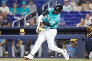 Apr 19, 2026; Miami, Florida, USA;  Miami Marlins shortstop Xavier Edwards (9) at bat against the Milwaukee Brewers during the first inning at loanDepot Park. Mandatory Credit: Rhona Wise-Imagn Images